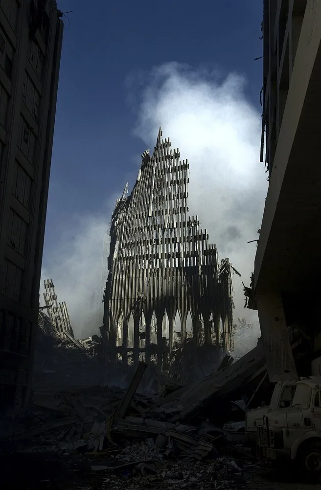 New York, N.Y. (Sept. 14, 2001) – What is left of the south tower of the World Trade Center in New York City, stands like a tombstone among the debris and devastation caused by the Sep. 11, terrorist attack. U.S. Navy photo by Journalist 1st Class Preston.